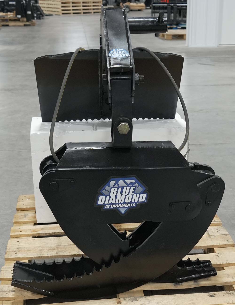 demo unit - mini skid steer log grapple - blue diamond